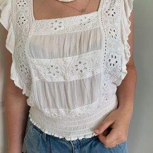 White Crop Top With Cutout Flowers